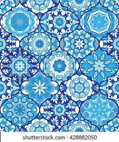 Vector ethnic colorful bohemian pattern in blue colors with big abstract flowers. Geometric background with Arabic, Indian, Moroccan, Aztec motifs. Ornate print with mandalas within clipping mask