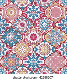 Vector ethnic colorful bohemian pattern in pastel colors with big abstract flowers. Geometric background with Arabic, Indian, Moroccan, Aztec motifs. Ornate print with mandalas within clipping mask