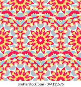 Vector ethnic colorful pattern in bright colors with big abstract flowers and suns. Geometric background with Arabic, Indian, Moroccan, Aztec motifs. Bold print with stars, mandalas, triangle, polygon