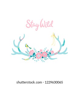 Vector ethnic deer horns with feathers and flowers. Modern romantic hand-drawn illustration in simple cartoon boho style in pastel colors.  Lettering. Stay wild