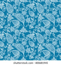 Vector ethnic Indian paisley floral seamless pattern on blue. Hand drawn vector illustration for prints, fabric, wrapping and other design.
