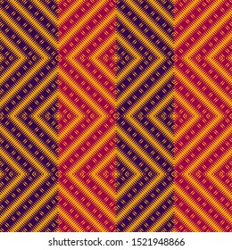 Vector ethnic  rhombs texture . Carpet or wallpaper pattern. Red, blue and yellow colors 