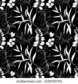 Vector Eucalyptus leaves branch. Exotic tropical hawaiian summer. Leaf plant botanical floral foliage. Black and white engraved ink art. Seamless background pattern. Fabric wallpaper print texture.