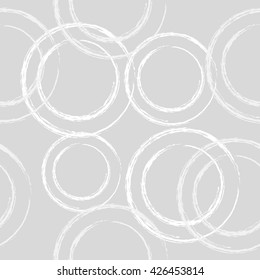 Vector fabric circles abstract seamless pattern on gray background.