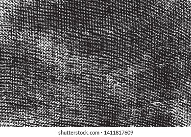 Vector fabric texture. Distressed texture of weaving fabric. Grunge background. Abstract halftone vector illustration. Overlay over any design to create interesting vintage rustic effect and depth.
