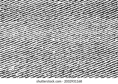 Vector fabric texture. Distressed texture of weaving fabric. Grunge background. Abstract halftone vector illustration. Overlay to create interesting effect and depth. Black isolated on white. EPS10.