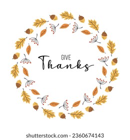 Vector fall wreath with orange and yellow leaves, acorn and rowan berries. Fall plant elements and slogan Give Thanks. Circle frame made from hand drawn botanical elements.
