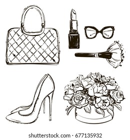 Vector fashion black and white sketch set. Hand drawn graphic shoes, bag, makeup brush, lipstick, flower box, eye glasses, flowers. Fashion illustration kit vogue style