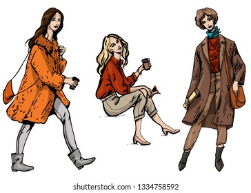 Vector fashion illustration beautiful set of three stylish girls in street fashion style in grey brown and orange colours isolated on white background