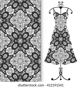 Vector fashion illustration. Women's black lace dress on a hanger and seamless doodle sketch pattern with hand drawn repeating texture. Isolated elements for scrapbook, invitations or cards design.