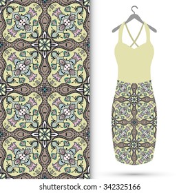 Vector fashion illustration. Women's dress on a hanger and seamless floral geometric pattern with repeating fabric texture. Hand drawn isolated elements for scrapbook, invitations or cards design.