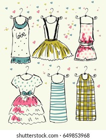 vector fashionable beautiful clothes for little girls.
