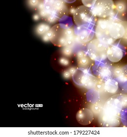 Vector festive background with defocused lights.