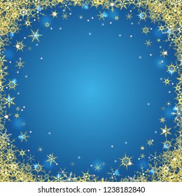 vector file with beautiful falling snow flakes colored golden and lightning effects on blue colored background