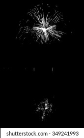 Vector Fireworks with reflection on lake