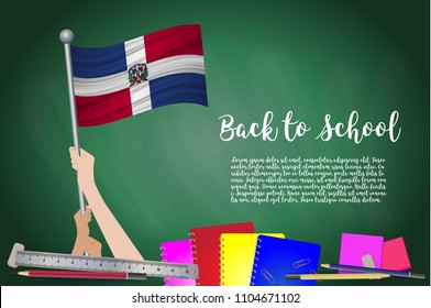 Vector flag of Dominican Republic on Black chalkboard background. Education Background with Hands Holding Up of Dominican Republic flag. Back to school with pencils, books, school items learning