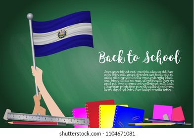 Vector flag of el salvador on Black chalkboard background. Education Background with Hands Holding Up of el salvador flag. Back to school with pencils, books, school items learning and childhood