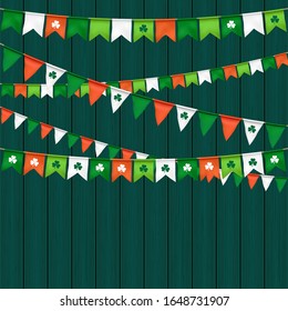 vector flag garland for st. patrick's day on wood background