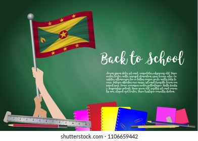 Vector flag of Grenada on Black chalkboard background. Education Background with Hands Holding Up of Grenada flag. Back to school with pencils, books, school items learning and childhood concept.