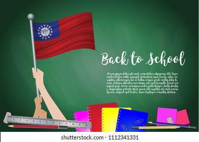 Vector flag of myanmar on Black chalkboard background. Education Background with Hands Holding Up of myanmar flag. Back to school with pencils, books, school items learning and childhood concept.
