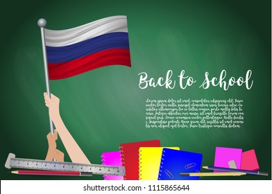 Vector Flag Of Russia On Black Chalkboard Background. Education Background With Hands Holding Up Of Russia Flag. Back To School With Pencils, Books, School Items Learning And Childhood Concept.