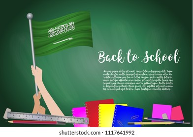 Vector flag of Saudi Arabia on Black chalkboard background. Education Background with Hands Holding Up of Saudi Arabia flag. Back to school with pencils, books, school items learning and childhood