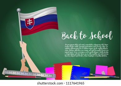 Vector flag of Slovakia on Black chalkboard background. Education Background with Hands Holding Up of Slovakia flag. Back to school with pencils, books, school items learning and childhood concept.