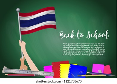 Vector flag of thailand on Black chalkboard background. Education Background with Hands Holding Up of thailand flag. Back to school with pencils, books, school items learning and childhood concept.