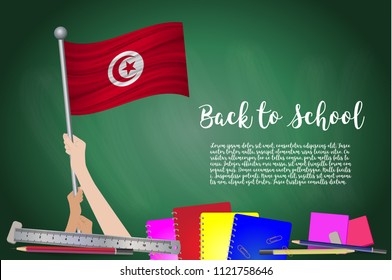 Vector flag of tunisia on Black chalkboard background. Education Background with Hands Holding Up of tunisia flag. Back to school with pencils, books, school items learning and childhood concept.