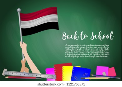 Vector flag of Yemen on Black chalkboard background. Education Background with Hands Holding Up of Yemen flag. Back to school with pencils, books, school items learning and childhood concept.