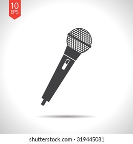 Vector flat black hand microphone icon on white background 