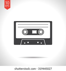 Vector flat black retro cassette icon on white background 