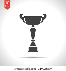 Vector flat black trophy goblet icon on white background . Winner award 