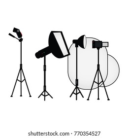 vector flat cartoon photo studio light equipment set. Flash light with softbox, umbrella, searchlight, dslr camera and reflector. Professional photo equipment. Isolated illustration, white background.