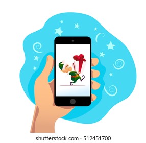 Vector flat christmas santa claus elf character portrait isolated on smartphone screen. Cartoon style illustration. Happy New Year, Merry Xmas design good for congratulation card, banner, flayer.