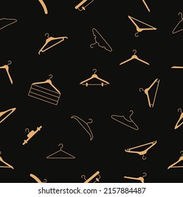 Vector flat hand drawn seamless pattern with hangers 