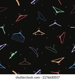 Vector flat hand drawn seamless pattern with hangers 