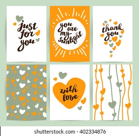 Vector flat holiday hand drawn creative card set. Hand written font. Lettering. Holiday congratulation. Postcard design. Love floral pattern. Packaging. Heart shape.