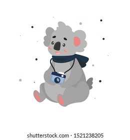 Vector flat illustration with a cute cartoon koala. Koala photographer is sitting with a camera. Koala is wearing a scarf. Around snowflakes and winter. Gift card for children.