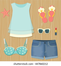 Vector flat illustration of flip flops, sunglasses,bra, lipstick, starfish and jeans shorts on the wooden background , top view.