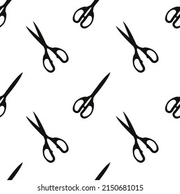 Vector flat silhouette hand drawn seamless pattern with pairs of scissors 