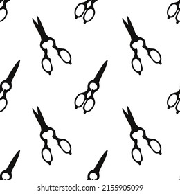 Vector flat silhouette hand drawn seamless pattern with pairs of scissors 