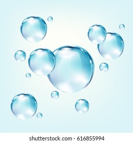 Vector floating water drops on blue background.