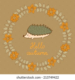 Vector floral card with wreath from flowers and branches. Vintage autumn card with cute little hedgehog and text "Hello autumn". Natural background