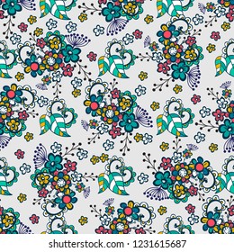 Vector floral ethnic seamless pattern in doodle style with flowers and leaves. Gentle, spring, summer floral background.