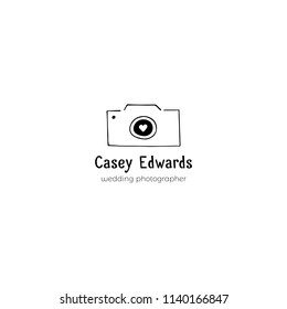 Vector floral hand drawn logo template. Camera silhouette. For badges, labels, branding business identity. For wedding photographer, photography studio or school. Black on white isolated symbol.