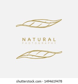 Vector floral hand drawn logo template in elegant and minimal style with gold color on grey background illustration. Botanicals logo. For badges, labels, logotypes and branding business identity.
