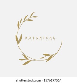 Vector floral hand drawn logo template in elegant and minimal style with gold color on grey background illustration. Circle frames logos. For badges, labels, logotypes and branding business identity.