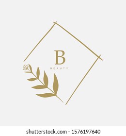 Vector floral hand drawn logo template in elegant and minimal style with gold color on grey background illustration. For badges, labels, logotypes and branding business identity.