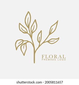 Vector floral hand drawn logo template in elegant and minimal style with gold color on grey background illustration. For badges, labels, logotypes and branding business identity.